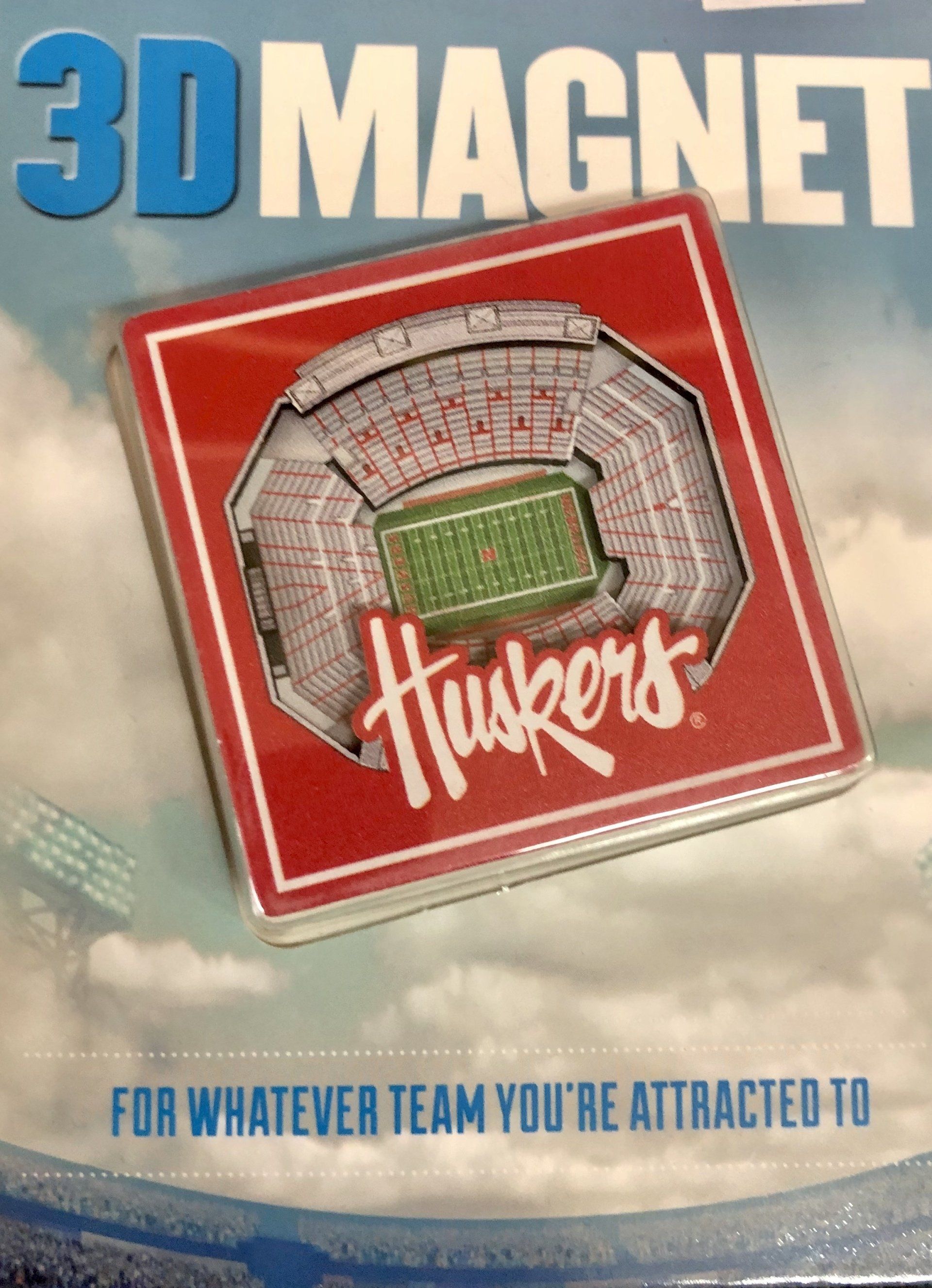 A 3D stadium magnet branded 
