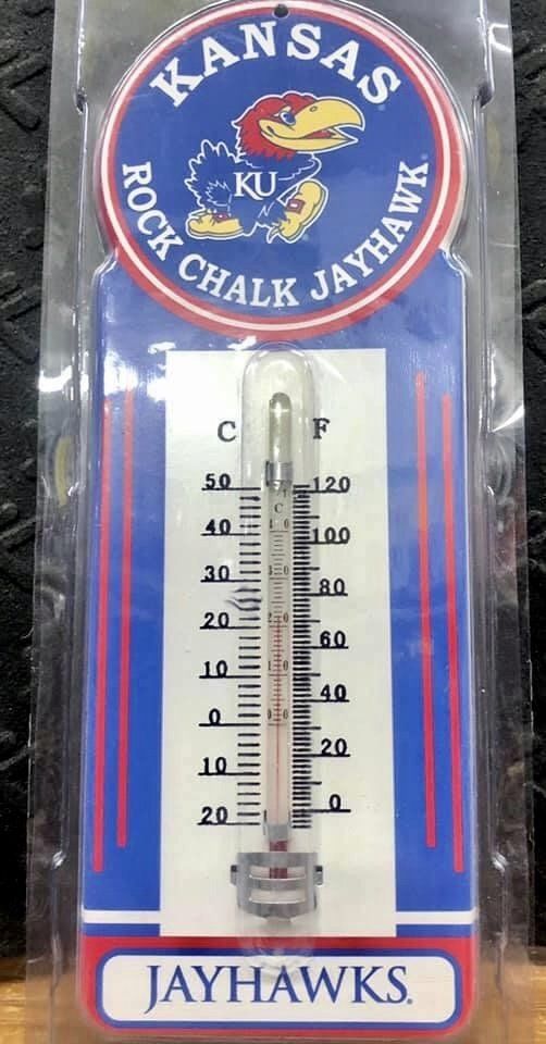 A Kansas Jayhawks-themed wall thermometer in its original plastic packaging.