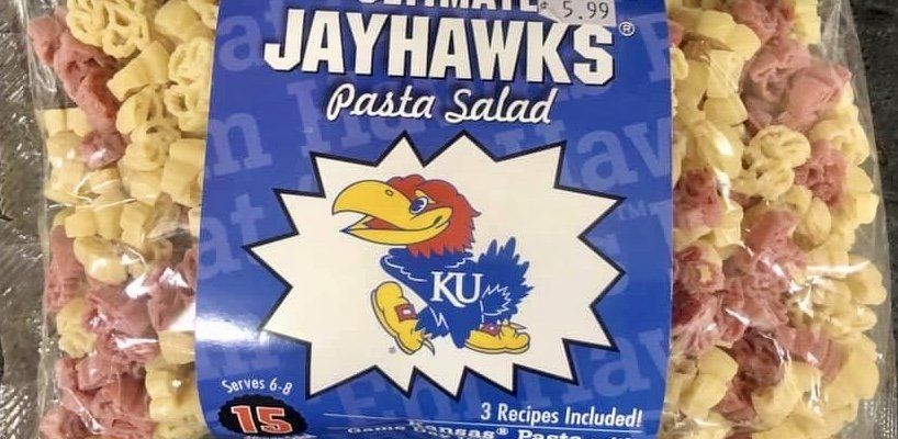 A bag of Jayhawks-themed pasta, featuring the University of Kansas mascot logo against a blue background.