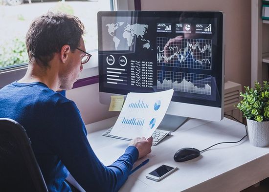 Business Audits — Accountant Reading Financial Report On Dashboard In Treasure Coast, FL Business Audits — Accountant Reading Financial Report On Dashboard In Treasure Coast, FL