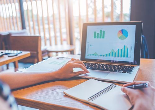 Business Consulting — Preparing Reports Presentation Using Laptop In Treasure Coast, FL