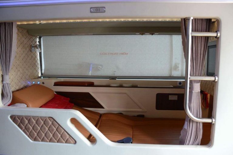 A very small room with a bed and a window.