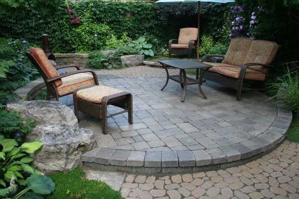 Circle paver patio with patio set