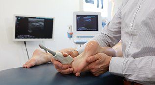 Diabetic Foot Care — Checking Ultrasound of a Foot in Sterling Heights, MI Diabetic Foot Care — Checking Ultrasound of a Foot in Sterling Heights, MI
