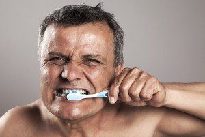 Old man brushing