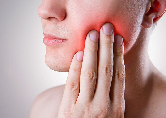woman with tooth sensitivity