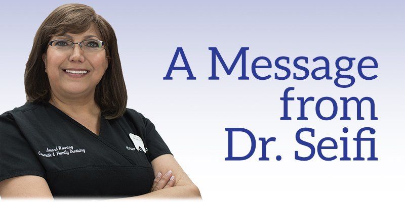 A woman in a black scrub top with the words a message from dr. seifi behind her