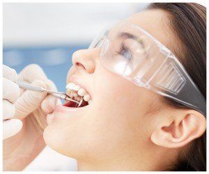 Young Woman Receiving Dental Exam at Starbrite Dental Rockville MD