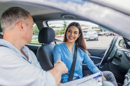 Kid Driving A Car — Driving Schools in Columbus, WI Kid Driving A Car — Driving Schools in Columbus, WI