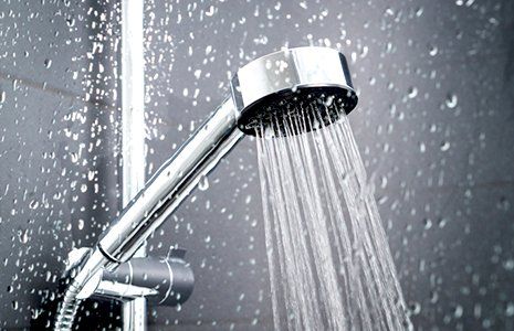 Washer Hook Up — Fresh Shower Behind Wet Glass Window in Griffin, GA
