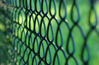 macro shot of chain link fence macro shot of chain link fence