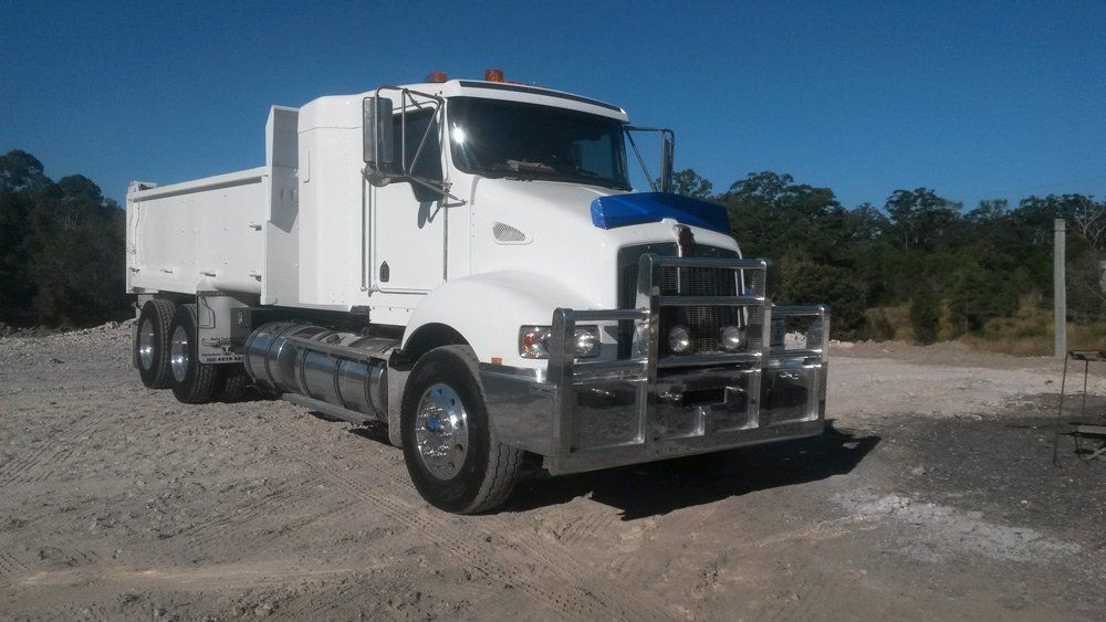 White Truck Side View — Edwards Transport, Cartage & Haulage in Gympie, QLD White Truck Side View — Edwards Transport, Cartage & Haulage in Gympie, QLD