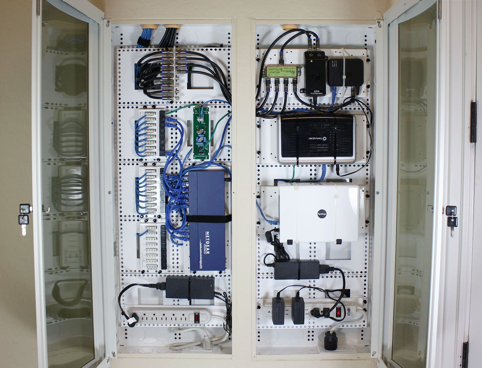 Man installing light switch after home renovation