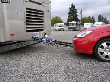 Towing car — rv appliances mead wa in Mead, WA Car traveling with a RV after RV repairs near Spokane WA