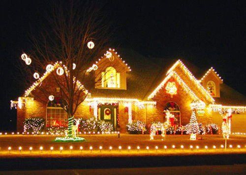 Home with holiday lighting and decorations