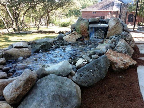 Stone waterfall hardscape design