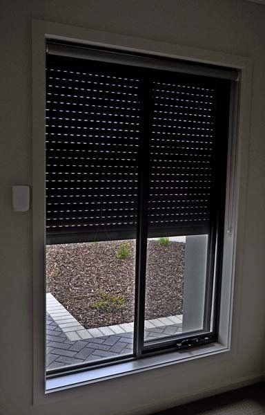 roller shutters on window