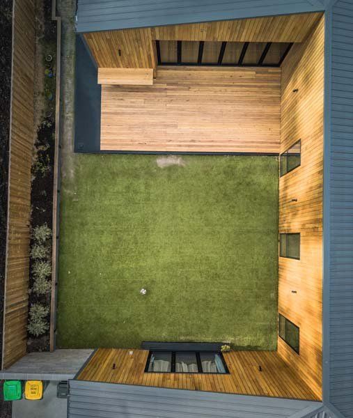 top down view of wooden exterior with yard