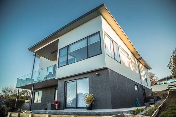two level modern house at sunrise