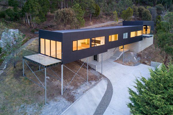aerial view of modern elevated home