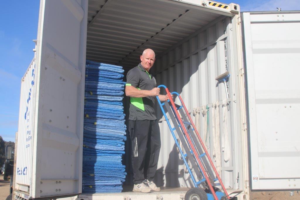 Furniture removals packing into truck
