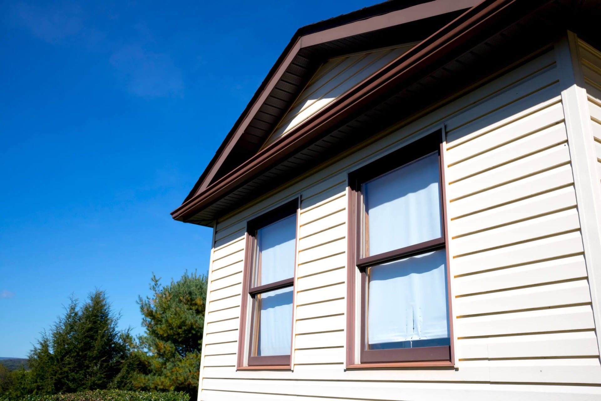 House with yellow Siding — Kingsport, TN — McClain Roofing and Siding House with yellow Siding — Kingsport, TN — McClain Roofing and Siding