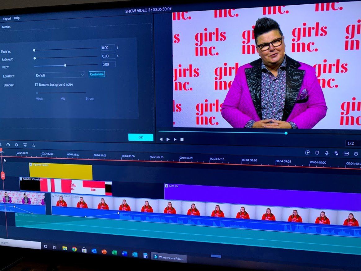 Video editing software interface with a person wearing a pink jacket and 