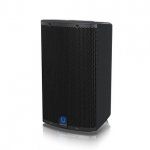 Black loudspeaker with a mesh front. Blue logo on the lower front. Angled, dark setting.