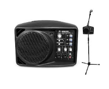 Black portable PA system with a microphone on a stand.