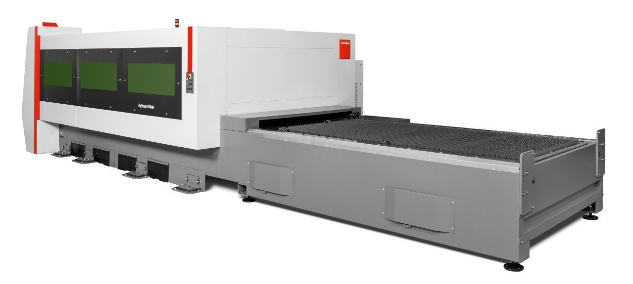 Industrial machine with a large gray conveyor bed and white housing, accented with orange, on a white background