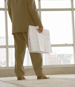 Employee holding paper works - Business Development in El Paso, TX