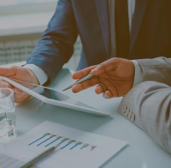 Pointing at touch-pad - Business Consulting in El Paso, TX