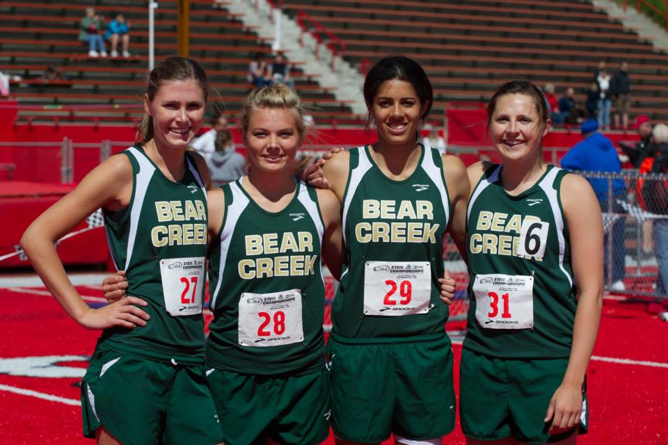 Four girls from bear creek are posing for a picture