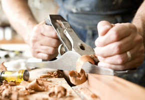 A carpenter craving wood
