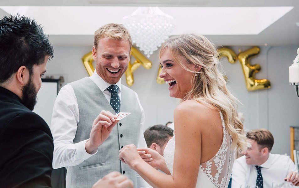 Bride and groom amazed by a wedding magician in Bristol