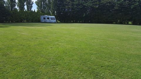 Just returned from a 5 day break at Manor Bungalow, we've stayed on the site before in our campervan but this time we stayed in the static caravan. It is very comfortable and has everything you need to make your stay a pleasant one, including a massive TV for those rainy days, it was bigger than ours at home! There are two bedrooms a large double with ensuite toilet and washbasin and a bedroom with two single beds, a bathroom with toilet and shower just opposite the two single bedroom, there is also the option of a pull out bed in the lounge making it a six berth. The kitchen is well equipped if you want to cook in the van but if you prefer not to there are plenty of places to eat out. The lounge diner is very comfortable with a large wrap around sofa just great for lounging after a hectic day. The van has a decking area with table and chairs for al fresco dining during the day or under the stars and you will see stars a plenty as there is absolutely no light pollution whatsoever. The site was very quiet with only one touring van on the field (only 5 tourers are allowed so it will never be that busy) perfect peace and quiet but near enough to the typically British seaside town of Skegness if you want a bit of action. The owners Carole and Mark are very friendly and if you are very lucky you might even get some of the delicious cake that Carole makes. Manor Bungalow is highly recommended whether you are touring or want a break in a comfortable static caravan. At the time of writing the static van is only £28 per night and the touring field is only £9 including electric per night.