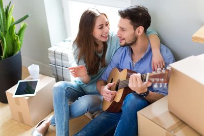 Playing guitar in a new home