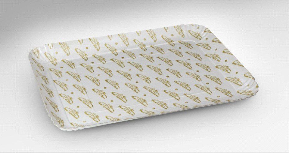 un vassoio bianco rettangolare con decorazioni oro