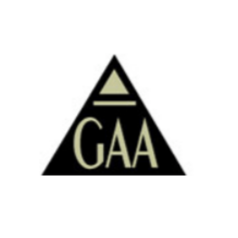 Black triangle with the letters