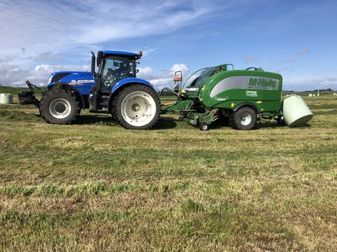 Johnstone Contracting baling baleage in Southland using film on film technology.