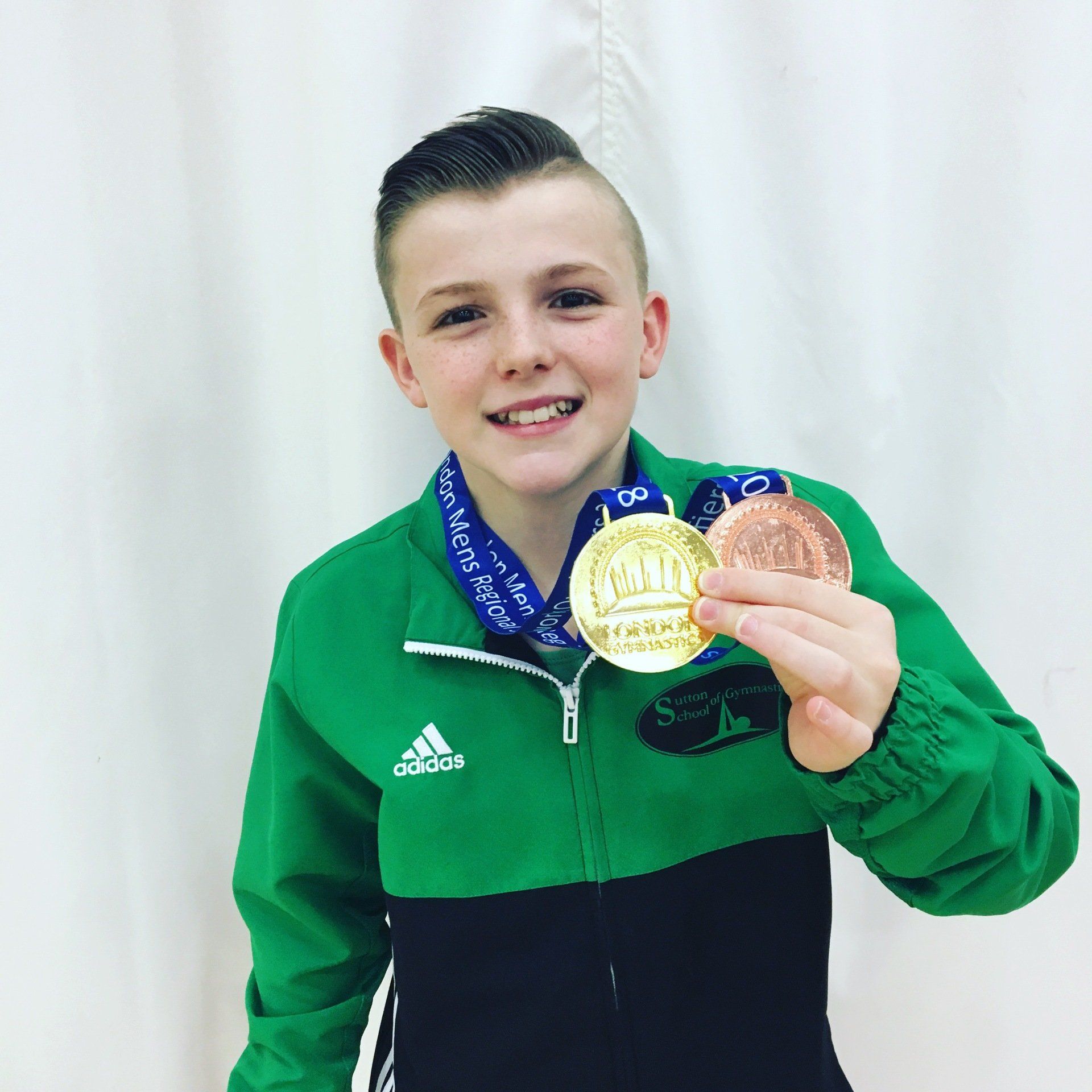 Gymnast showing medals