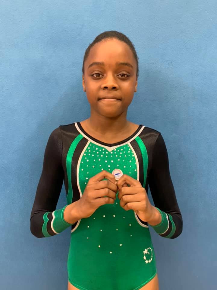 Gymnast celebrating after a competition
