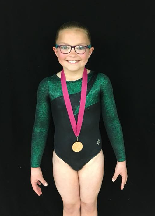 gymnast with medal