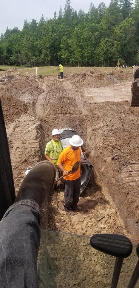 Contractors — Two Man Working on Construction Site in Spring Hill, FL Contractors — Two Man Working on Construction Site in Spring Hill, FL