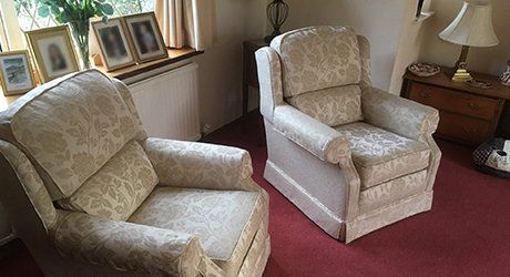 sofa chairs by the window