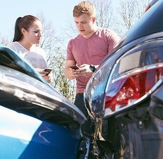 Two Drivers Exchange Insurance Details After Accident—Insurance in Burlington, NJ Two Drivers Exchange Insurance Details After Accident—Insurance in Burlington, NJ