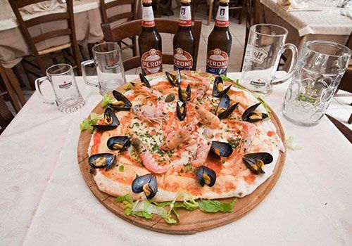 pizza con cozze e gamberi