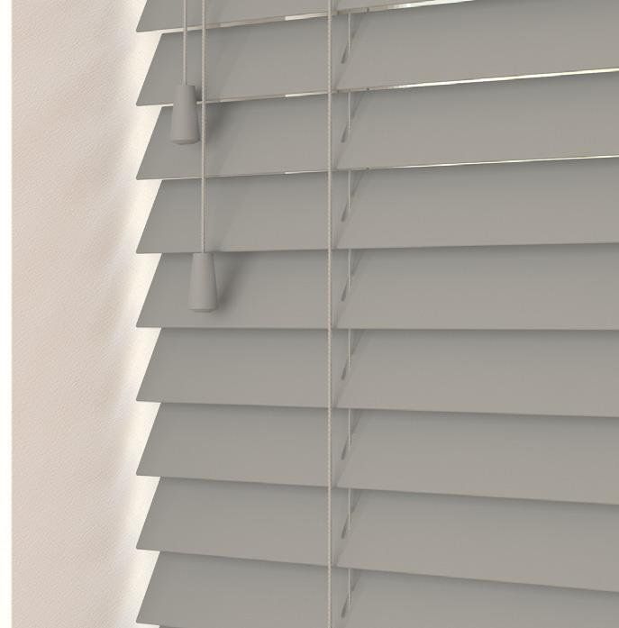 A close up of a grey wooden blind on a window.