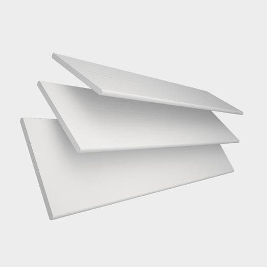 Three white sheets of paper are stacked on top of each other on a white background.