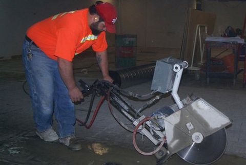 Man Cutting Concrete - Concrete Cutting Services in Milton, WA Man Cutting Concrete - Concrete Cutting Services in Milton, WA
